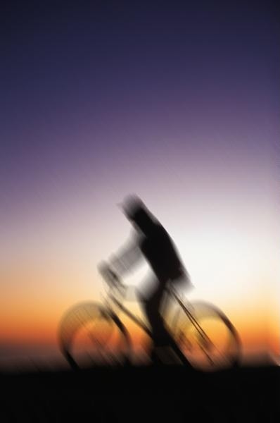 cyclist at dawn