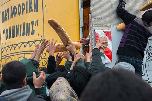Local Greek charities offer daily respite from the dreary food being given to the residents of the Idomeni camp. Distribution is chaotic as people clamour for fresh bread, eggs, fruit and vegetables. March 10, 2016