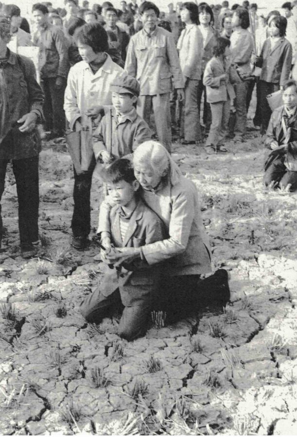 Grandmother teaching her grandson to pray for the first time – Photo courtesy of Kenneth Dean