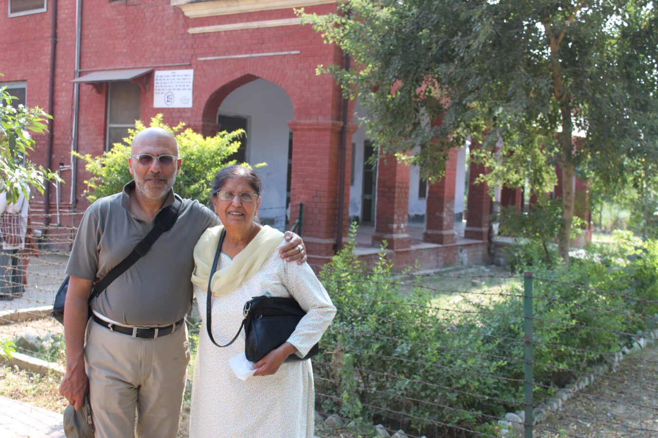 Himmat & Surjit outside the hospital in Dayalbagh where Himmat was born, 2011 © René Tousignant